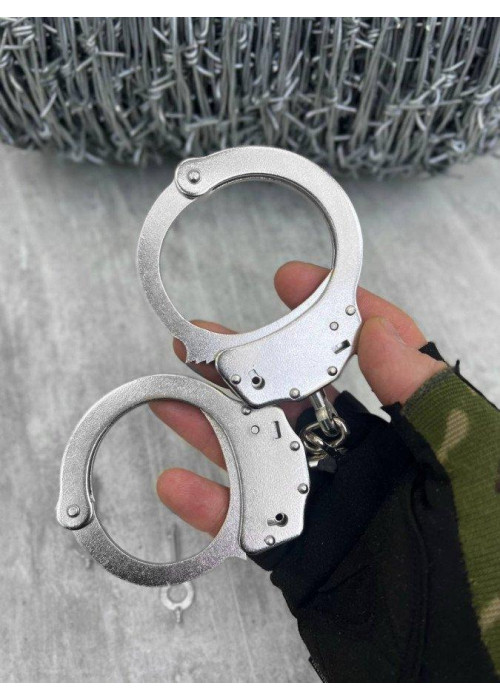 Справжні сталеві наручники  кайданки  для поліції Сріблястий